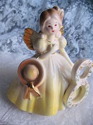 VanessaPalmerBlas/ceramicbirthdaydoll.jpg